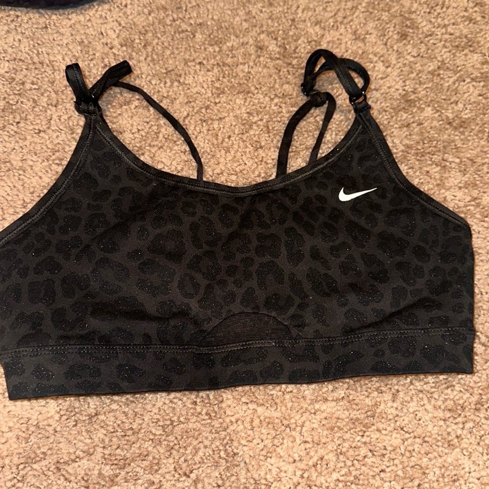 Women’s Nike black cheetah print sports bra with glitter.